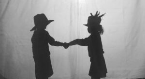 Shadows of two young people shaking hands, part of the My Self project 2019