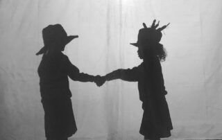 Shadows of two young people shaking hands, part of the My Self project 2019