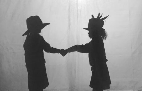Shadows of two young people shaking hands, part of the My Self project 2019