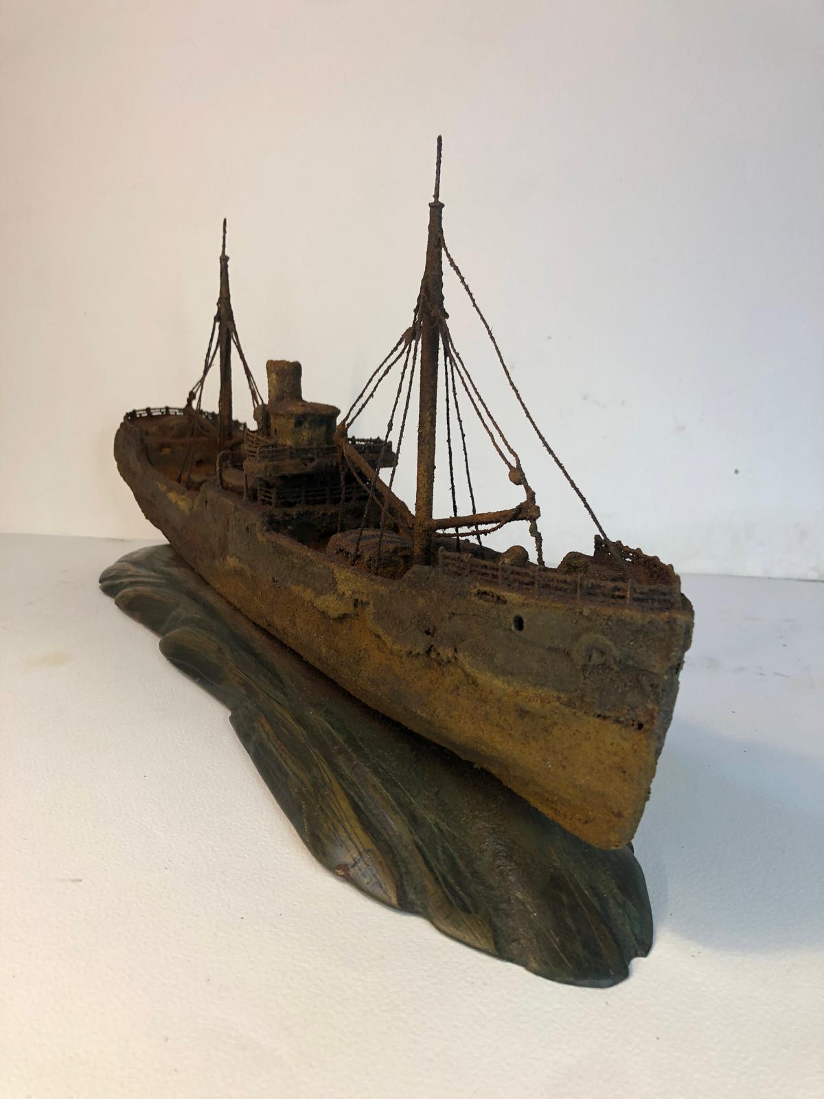 Steve Betts. 'Alice Aground', 2024. Steel, resin on driftwood base